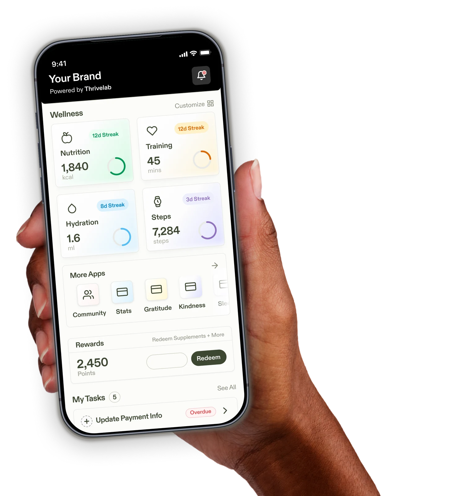 A person holding a phone showing the Your Brand app dashboard
